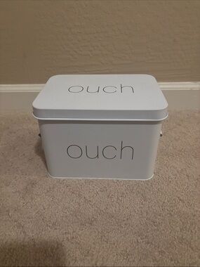 White 'ouch' Metal Storage Tin